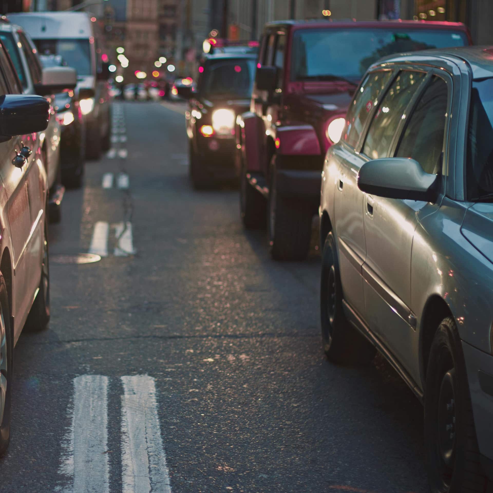 Traffic congestion on a busy city street, highlighting the aftermath of a wreck and what to do after a car accident.